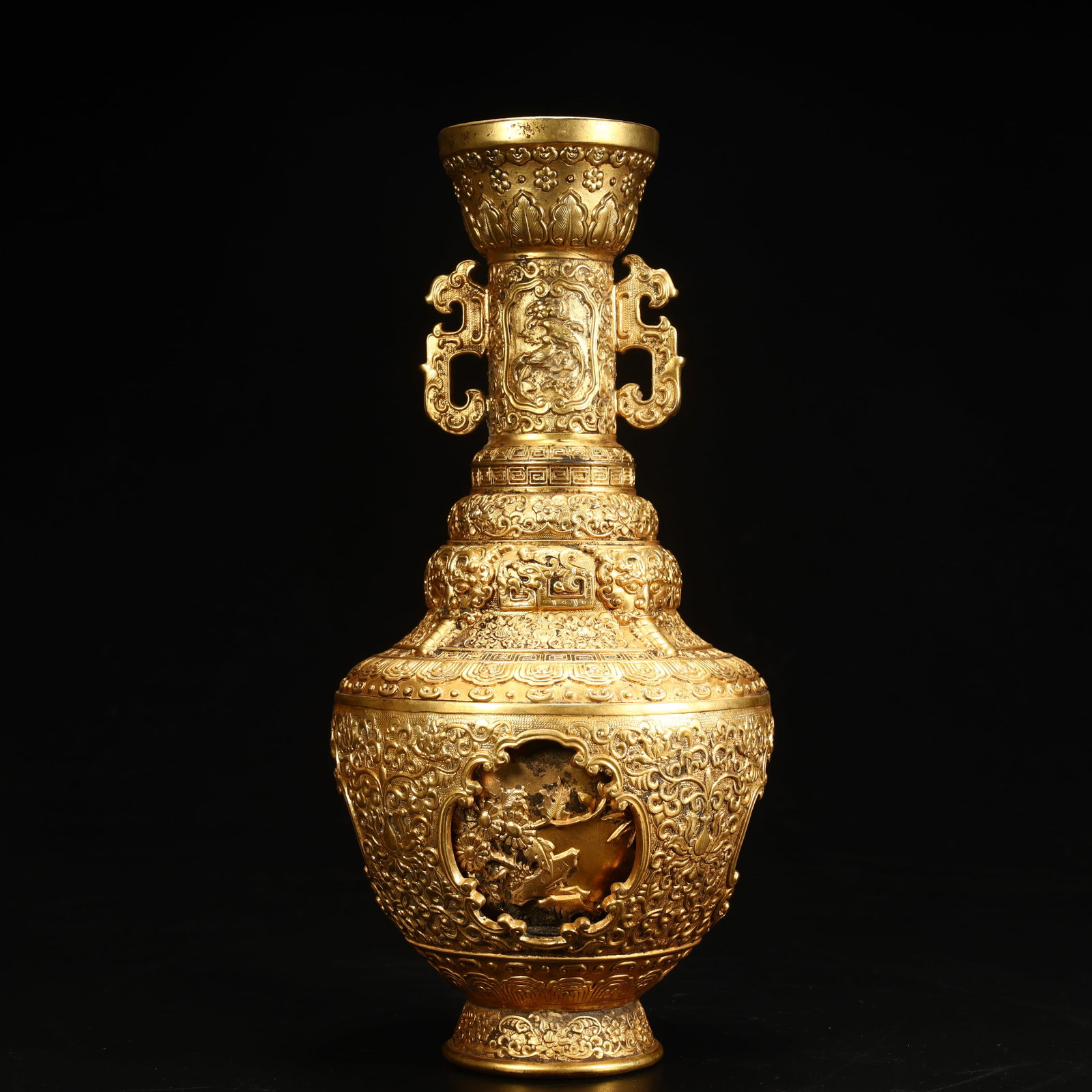 A Qing Dynasty copper gilded hollow two-handled vase with story patterns on figures (1 of 12)