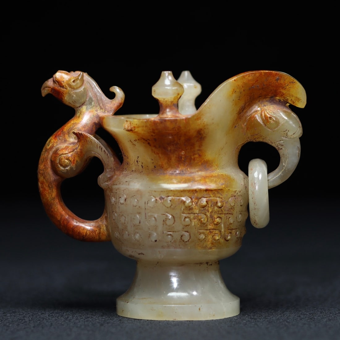 A beautiful Hetian jade phoenix ear wine cup: Exquisite Hetian jade phoenix-ear wine glass Size:8.9x9.6x5.3cm W:0.2064kg (The Dimensions Of All Batches Are Manually Measured.If You Need More Detailed Information, Please Contact Our Customer Servi