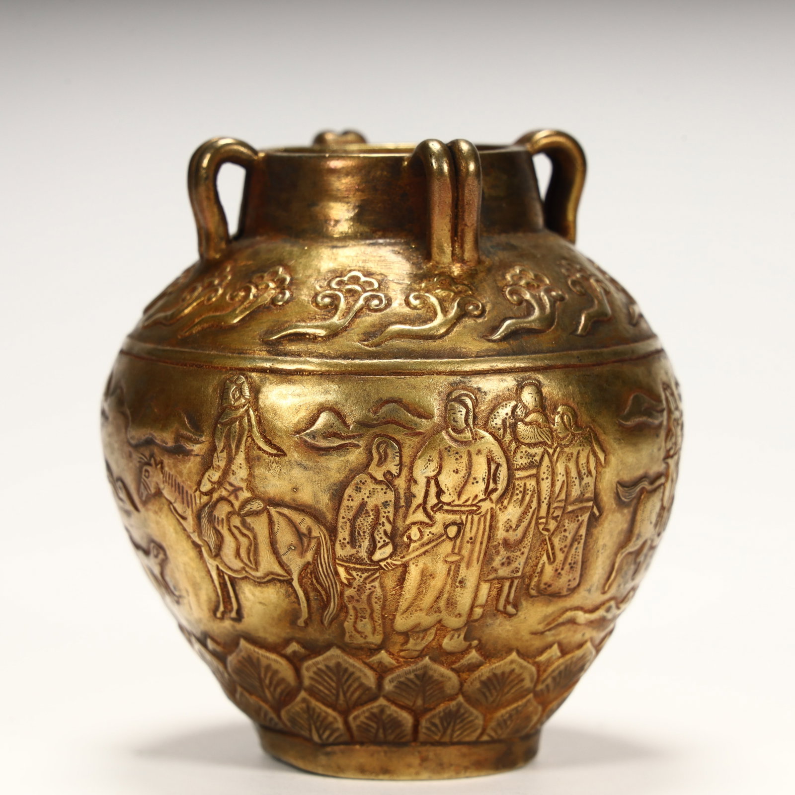 A Tang Dynasty jar with a gilt figure pattern and four-string vessel: Tang dynasty gilded four-line jar with human figures SIZE: H:8cm L: 7.5cm W:7.5cm W:79.3g (The Dimensions Of All Batches Are Manually Measured.If You Need More Detailed Information, Please Contact Our