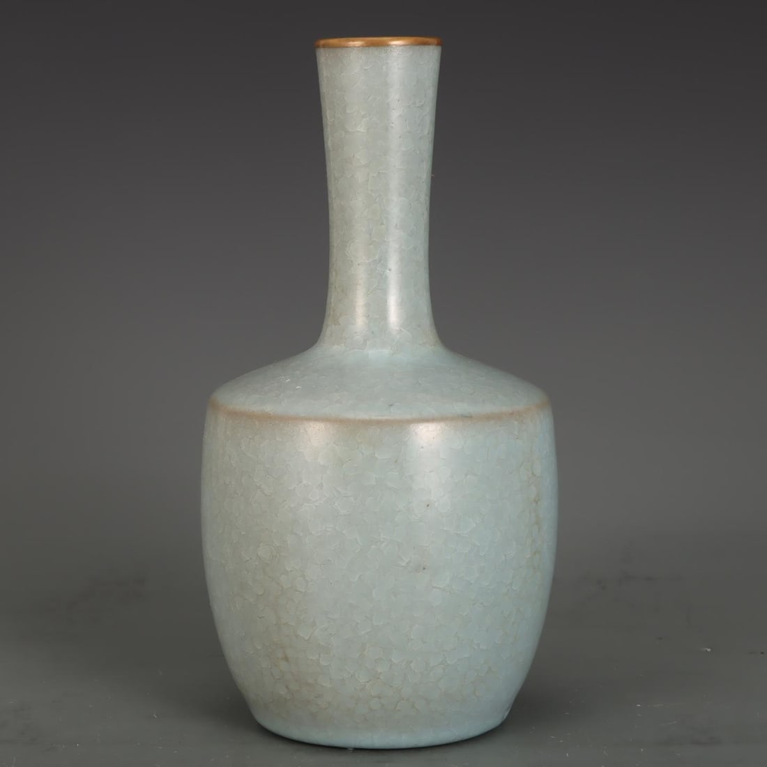 A Song Dynasty Ru kiln vase with sky-blue glaze and gilded lattice fittings: A Song dynasty Ru kiln vase with sky-blue glaze and gilded topping paper hammer vase Size:H:23cm Belly diameter:12.3cm (The Dimensions Of All Batches Are Manually Measured.If You Need More Detailed In
