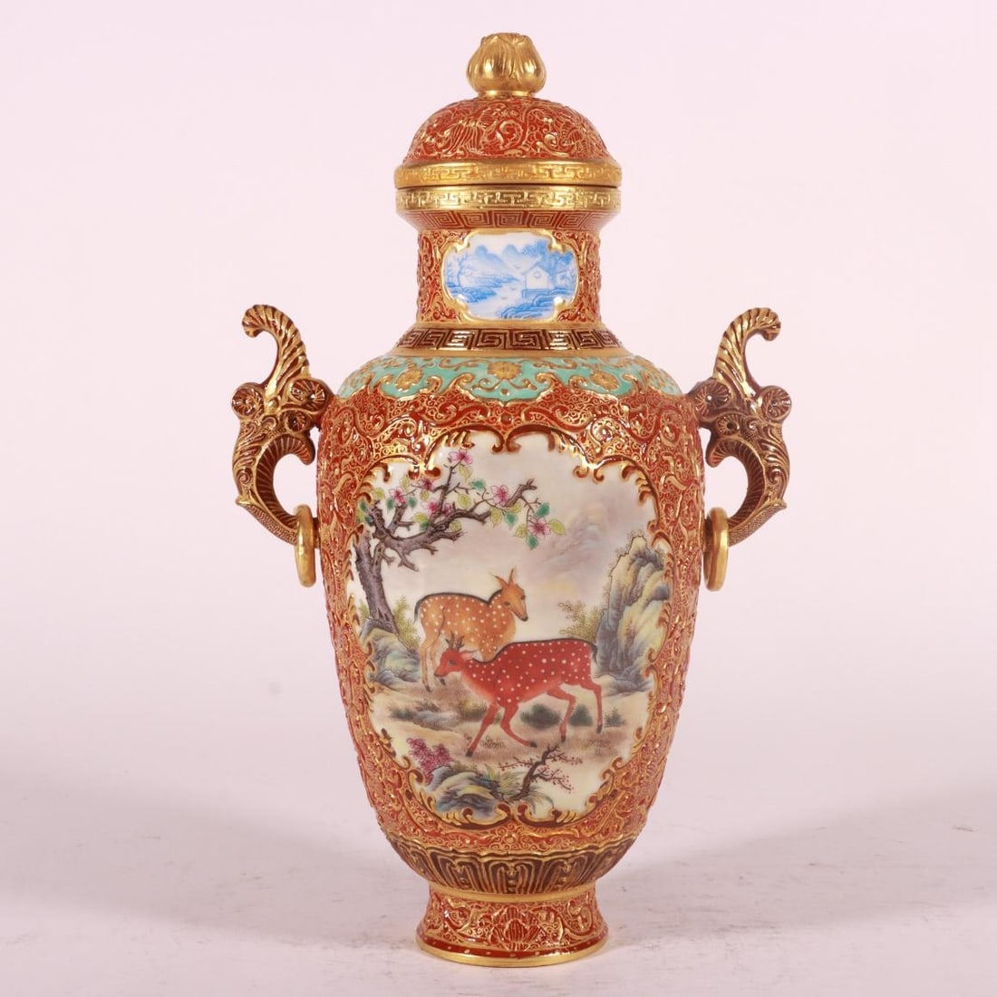 A Qing Dynasty Qianlong period enamel and alum red carved gold-painted window beast double-handled: A double-handled jar made during the Qianlong period of the Qing Dynasty, made in the Qing Dynasty, with enamel, alum, red carving, and gilded window and walking beasts Size:H:26cm Belly diameter:11cm