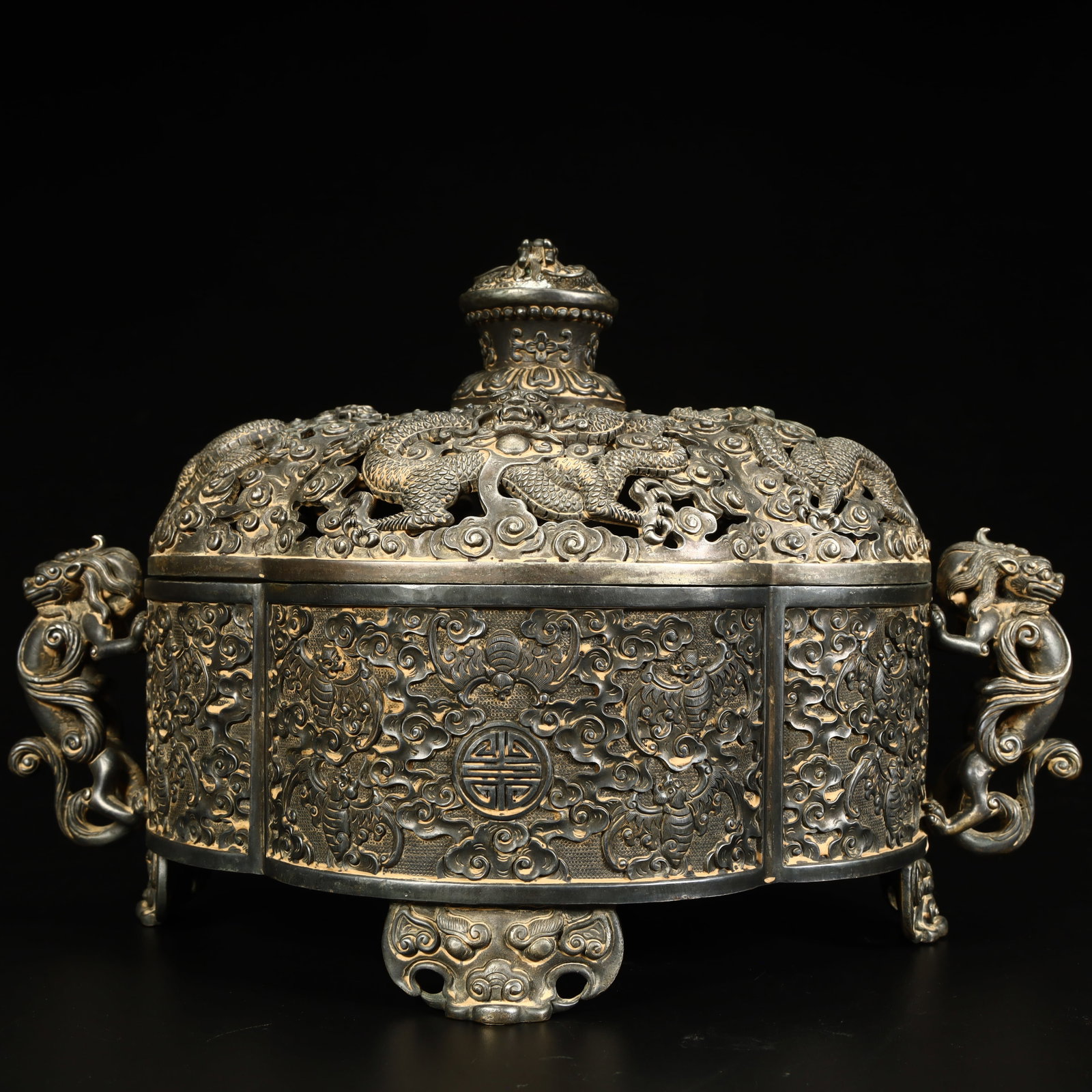 A Qing Dynasty silver hollowed-out dragon pattern chi ear incense burner (1 of 11)
