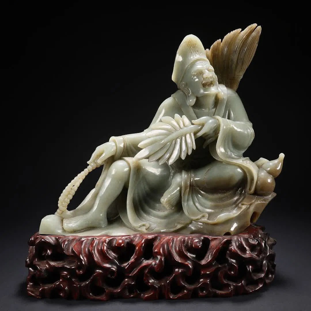 A Qing Dynasty Hetian jade Jigong ornament: Qing Dynasty Hetian jade Jigong ornament SIZE: Total H: 23.5cm, Jade L: 22cm W: 7.5cm H: 19.7cm W: 1848g (The Dimensions Of All Batches Are Manually Measured.If You Need More Detailed Information, Ple