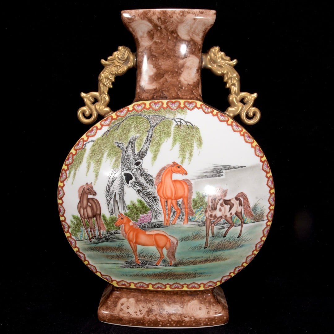 A Qing Dynasty Yongzheng period vase with eight steeds patterned moon-embracing vase: A vase with eight steeds and a moon-embracing vase with the Eight Steeds motif made during the Yongzheng period of the Qing Dynasty Size:42x30cm (The Dimensions Of All Batches Are Manually Measured.If