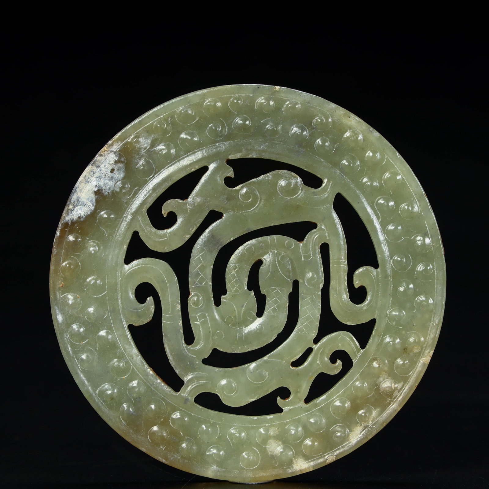 A finely crafted hollowed-out jade bi with Chilong Valley patterns (1 of 8)