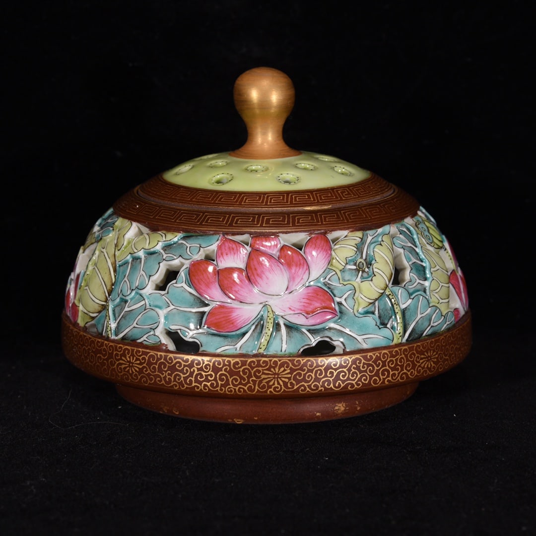 A famille rose gilt hollow lotus leaf pattern incense burner made during the Qianlong period of the (1 of 9)