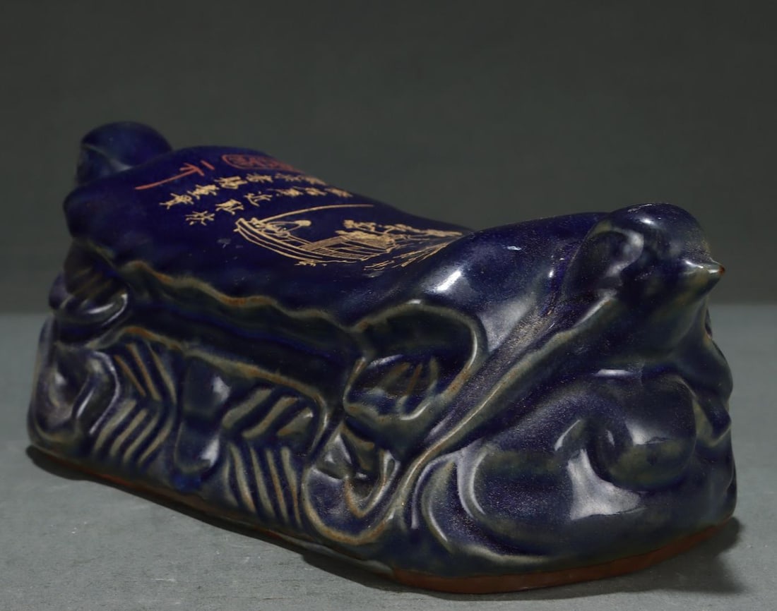 A Song Dynasty Ding Kiln porcelain pillow featuring gold-painted and inscribed figures (1 of 8)