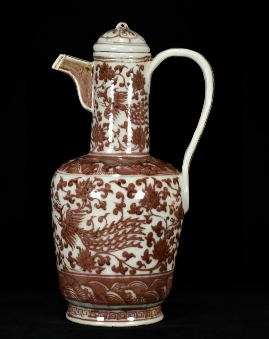 A Ming Dynasty Xuande period teapot with a red underglaze phoenix and lotus flower pattern (1 of 9)