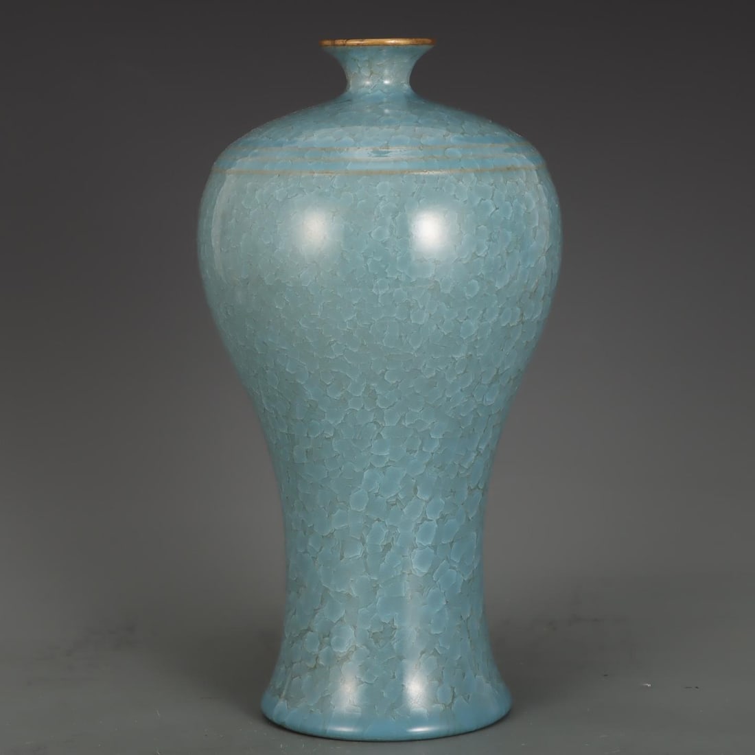 A Song Dynasty Ru kiln vase with sky-blue glaze ice crack patterns inlaid with gold-tipped plum (1 of 7)