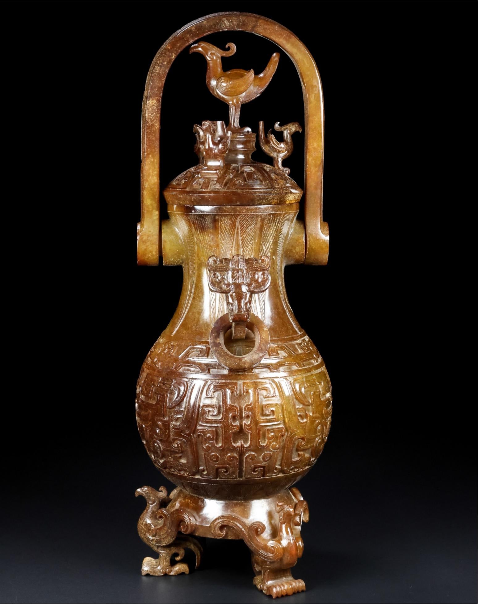 A fine Hetian jade carrying vase: Exquisite Hetian jade handle-carrying vase Size:30x10.8x10.8cm W:1.3921kg (The Dimensions Of All Batches Are Manually Measured.If You Need More Detailed Information, Please Contact Our Customer Servic