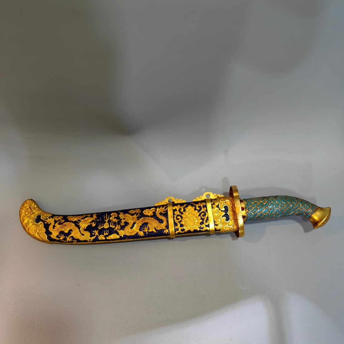 A Qing Dynasty gilt cloisonne knife (1 of 9)