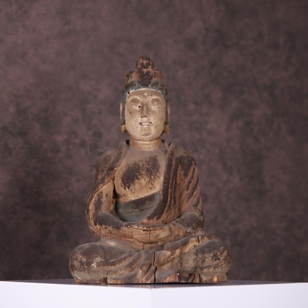 A Song Dynasty nanmu wood carved and painted seated Guanyin statue (1 of 9)