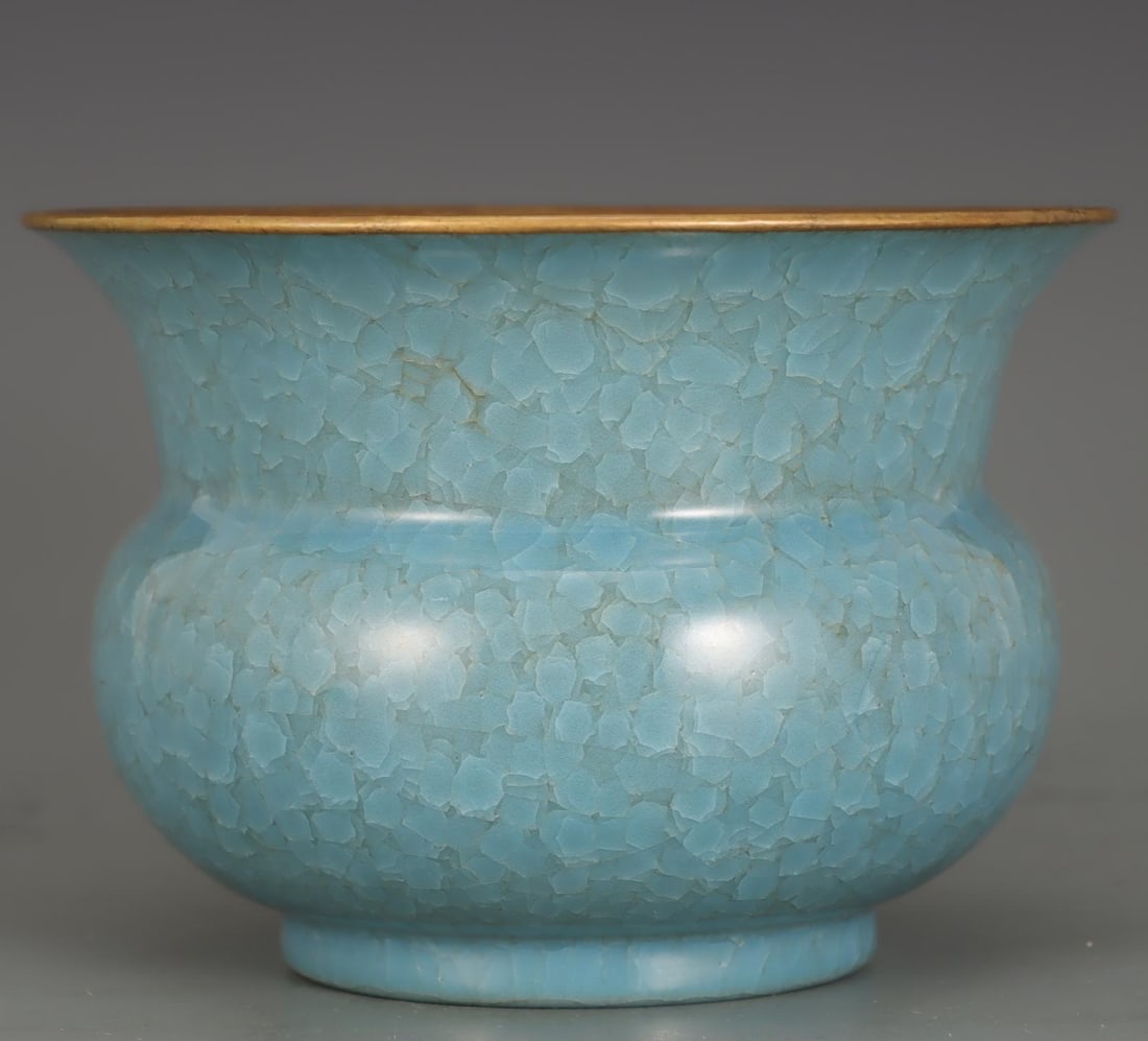 A Song Dynasty Ru kiln ware with sky-blue glaze ice crack pattern inlaid with gold buckle slag: Song dynasty Ru kiln ware with sky-blue glaze ice crack pattern inlaid with gold buckle slag cup Size:H:13cm Calibre:18.5cm (The Dimensions Of All Batches Are Manually Measured.If You Need More Detail