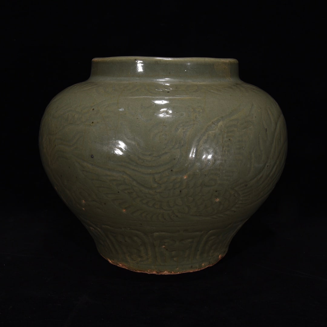 A Song Dynasty Longquan kiln jar with dragon and phoenix auspicious patterns in glaze (1 of 9)