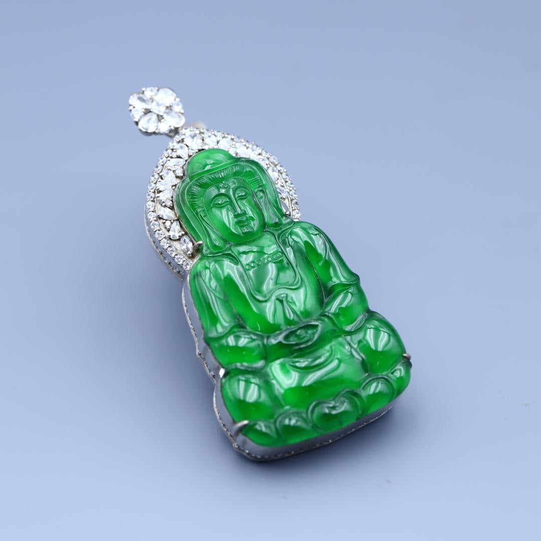 A delicate high ice full green jade Guanyin pendant (1 of 9)