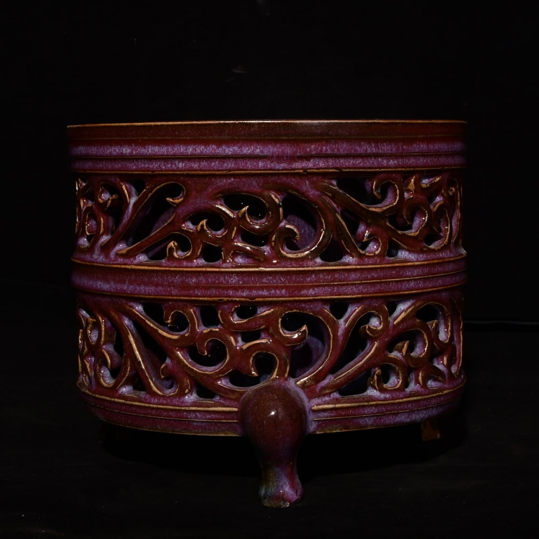 A Song Dynasty Jun kiln openwork three-legged case: The openwork tripod case from the Jun kiln of the Song Dynasty Size:15.2x18cm (The Dimensions Of All Batches Are Manually Measured.If You Need More Detailed Information, Please Contact Our Customer Se