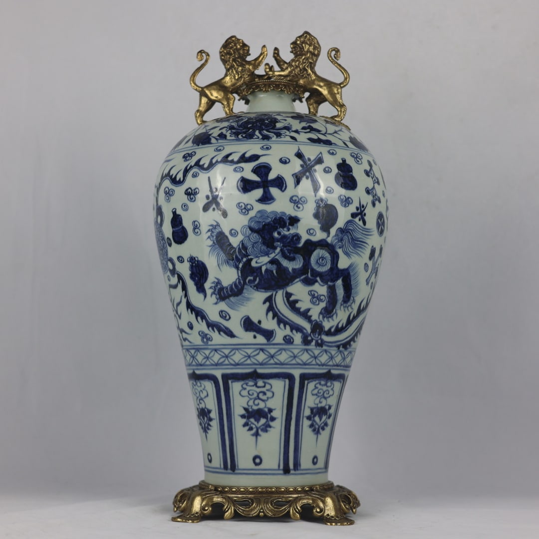 A fine Yuan blue-and-white lion play ball pattern bronze-inlaid lion double-handled plum vase (1 of 9)
