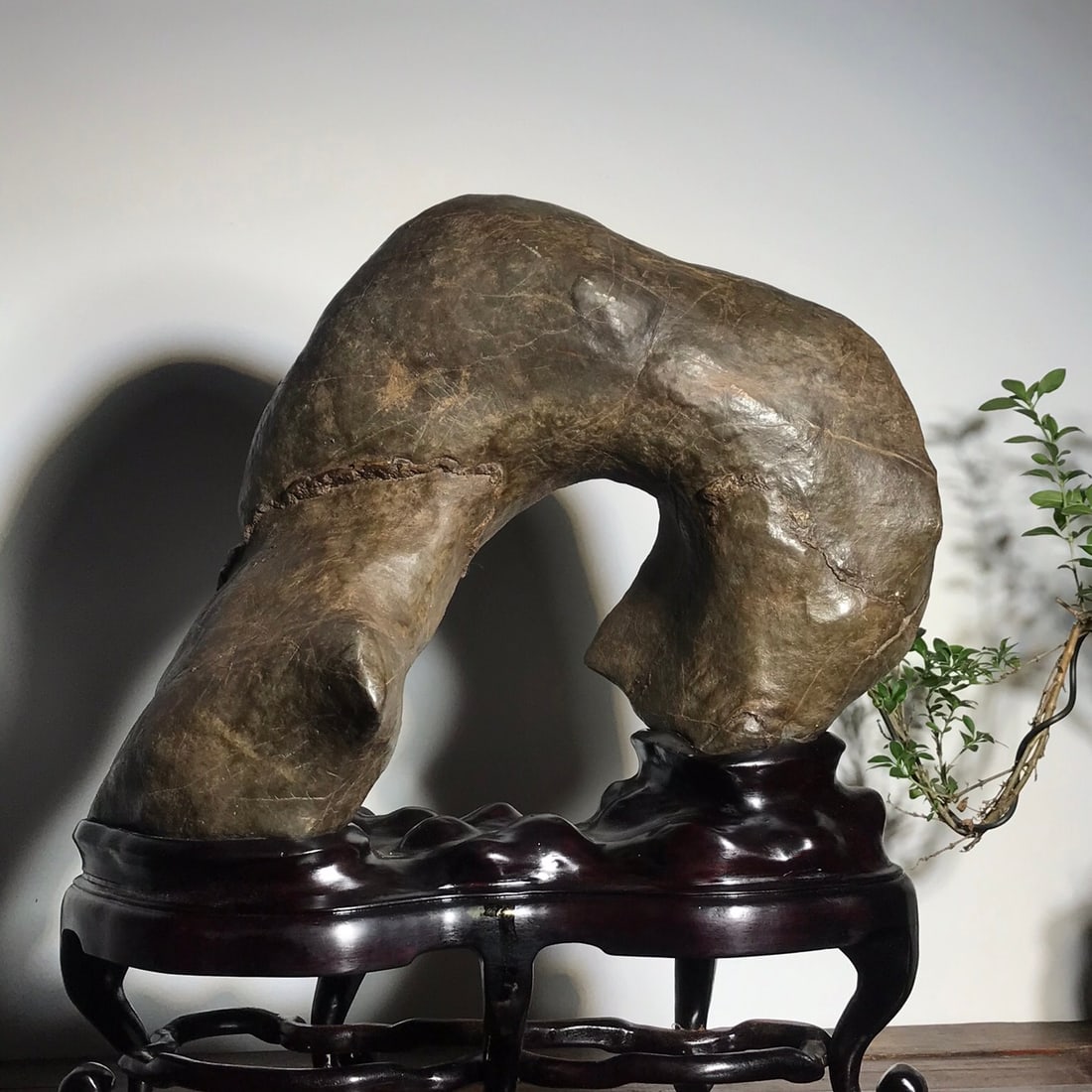 A beautiful Canglang Li stone type Taihu stone: Exquisite Canglang Li stone-type Taihu stone Size: with seat: L: 40cm W: 35cm T: 18cm (The Dimensions Of All Batches Are Manually Measured.If You Need More Detailed Information, Please Contact Our Cus