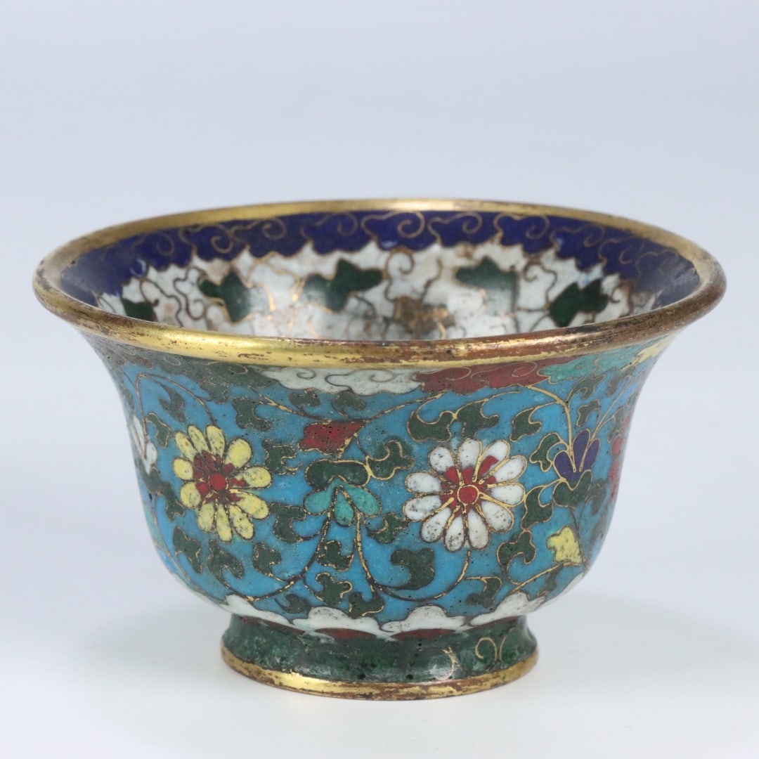 A Ming Dynasty Jingtai period gilded cup with entwined floral patterns (1 of 9)