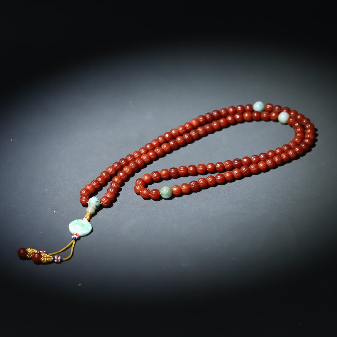 A beautiful red agate melon-ridge bead paired with jadeite 108 rosary beads (1 of 9)