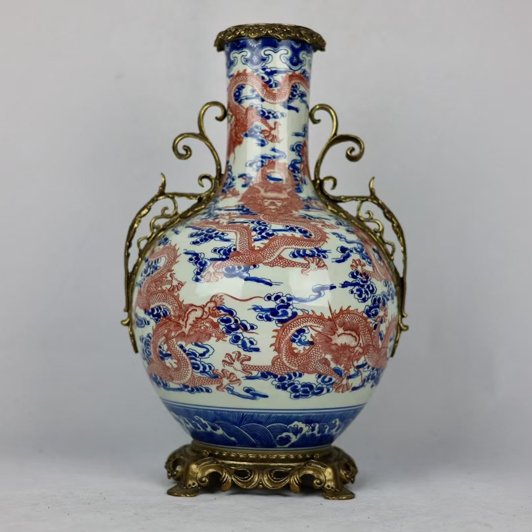 A fine blue-and-white underglaze red cloud dragon pattern double-handled celestial sphere vase with (1 of 9)