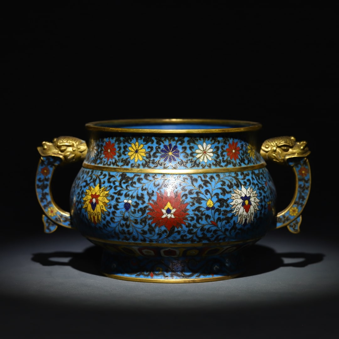 A Qing Dynasty bronze-bodied cloisond-enamel entwined lotus pattern dragon-ear incense burner