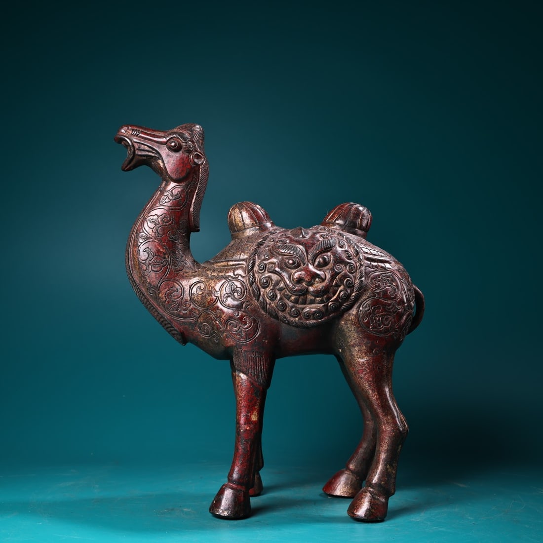 A finely crafted pure copper high-relief carved lacquered camel with gold lacquer (1 of 9)