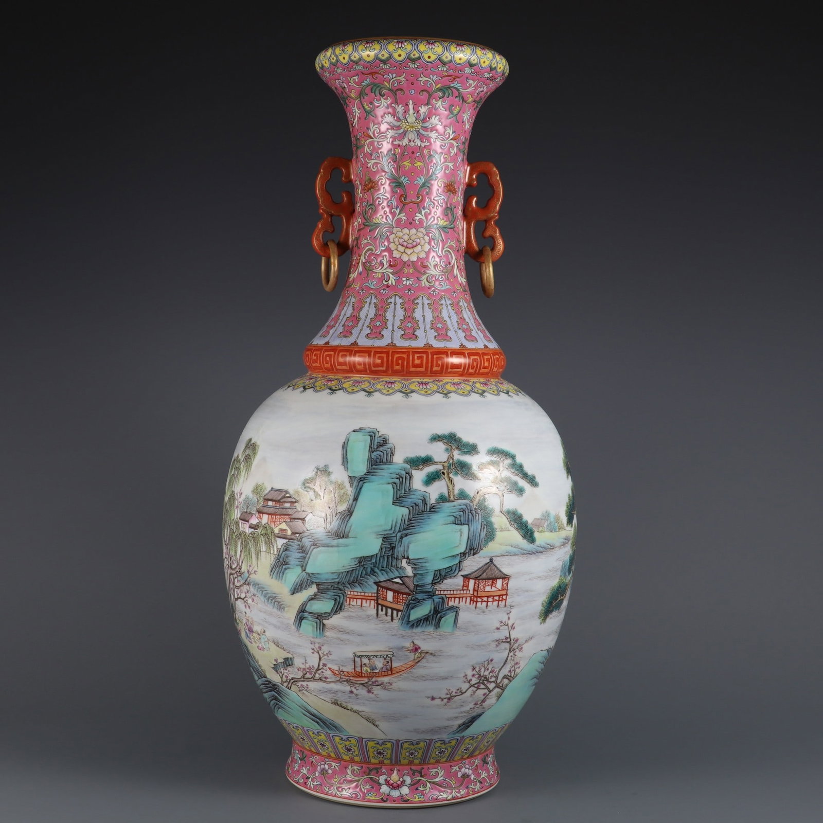 A large double-handled bottle from the Qianlong period of the Qing Dynasty with famille rose: A large double-handled bottle with famille rose landscape and character stories, made during the Qianlong period of the Qing Dynasty Size: H: 56.2cm Calibre: 12cm Belly diameter: 25cm (The Dimensions 