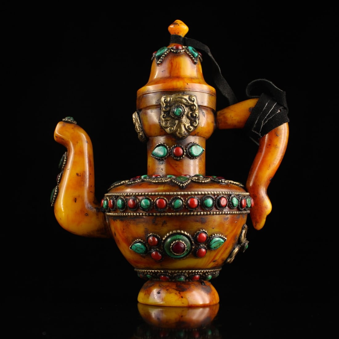 A beautifully handcrafted gem-inlaid cloisonnÃ© beeswax wine flask