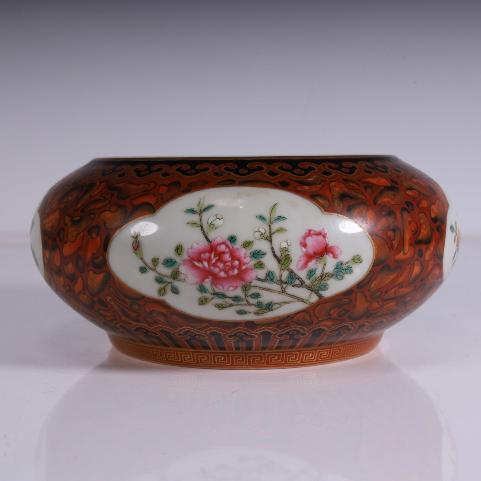 A Qing Dynasty wood-glazed window-opening famille rose floral brush washer (1 of 9)