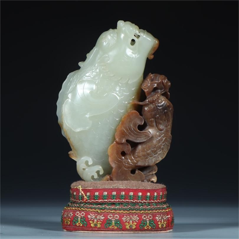 A delicate piece of Hetian jade seed jade that stands out as the top ornament: Exquisite Hetian jade seed jade stands out as the top ornament Size:L:8.8cm W:3.2cm H:12.8cm W:0.422kg (The Dimensions Of All Batches Are Manually Measured.If You Need More Detailed Information, Pleas