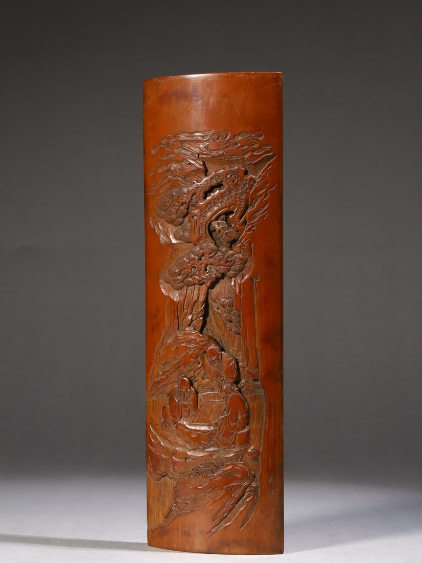 A Qing Dynasty bamboo carving of a chess arm resting under a pine tree: A bamboo carving from the Qing Dynasty with a chess arm beneath the pine Size:L:28cm W:8.8cm W:0.225kg (The Dimensions Of All Batches Are Manually Measured.If You Need More Detailed Information, Pleas