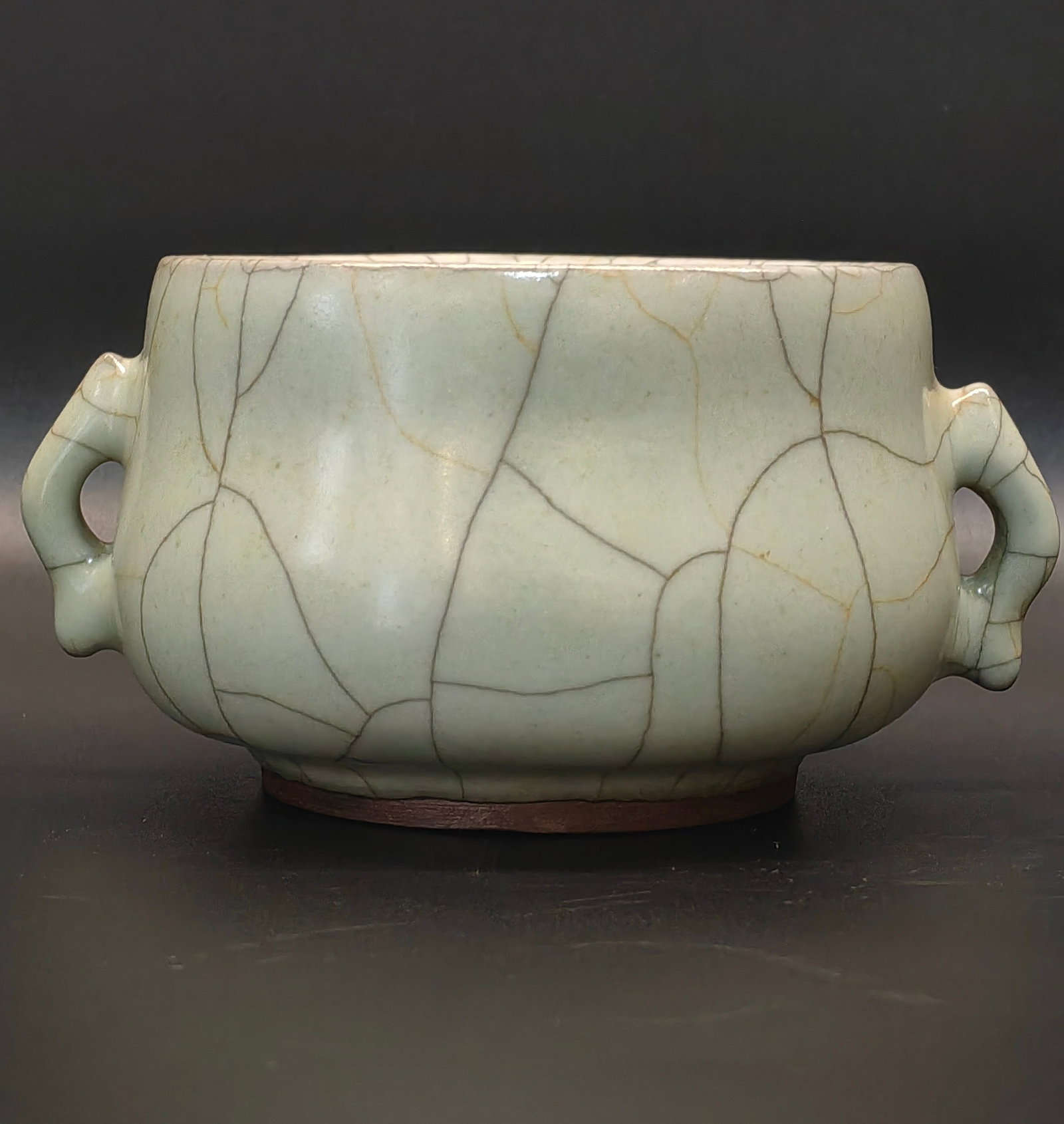A double-handled incense burner from the Song Dynasty official kiln: Double-handled incense burner from the Song Dynasty official kiln Size:H:6cm Calibre:8.5cm (The Dimensions Of All Batches Are Manually Measured.If You Need More Detailed Information, Please Contact Ou