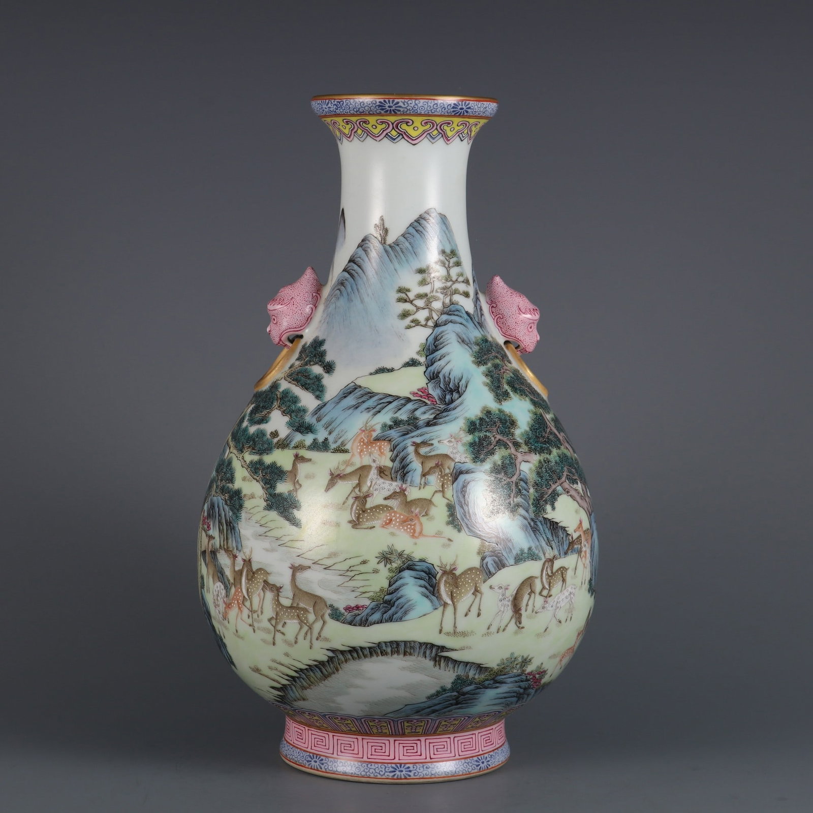 A famille rose bottle with deer and animal handles made during the Qianlong period of the Qing: A famille rose deer beast-ear vase made during the Qianlong period of the Qing Dynasty Size:H:30.5cm Belly diameter:18cm (The Dimensions Of All Batches Are Manually Measured.If You Need More Detailed 