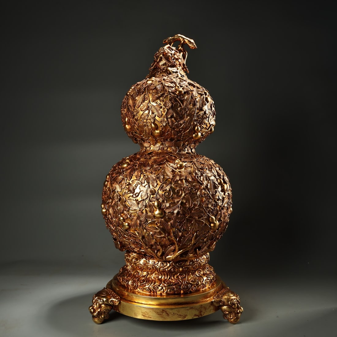 A Huge Gilt Bronze Bats and Gourd Pattern Gourd-Shaped Vase,With Beast Legs Base: A Huge Gilt Bronze Bats and Gourd Pattern Gourd-Shaped Vase,With Beast Legs Base,Qing Dynasty, China,Size:54cmx26cm,Weight:8300g (The Dimensions Of All Batches Are Manually Measured.If You Need More D