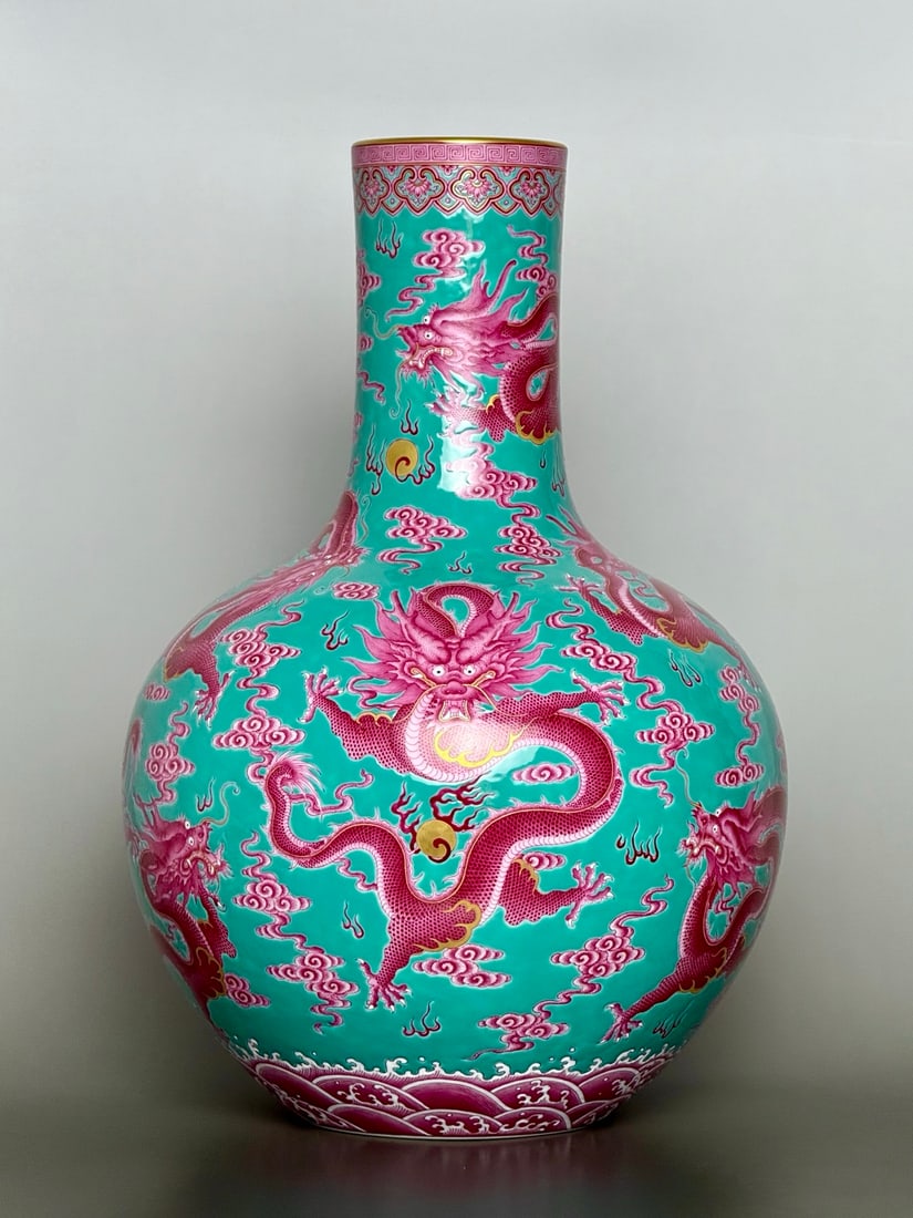 A Rare Turquoise Ground Famille-Rose Painted Gold Auspicious Cloud and Dragon Pattern Vase: A Rare Turquoise Ground Famille-Rose Painted Gold Auspicious Cloud and Dragon Pattern Vase,Qing Dynasty,China,Yongzheng Six-character Mark,Size:38.5cmx25.3cmx12.1cm (The Dimensions Of All Batches Are 