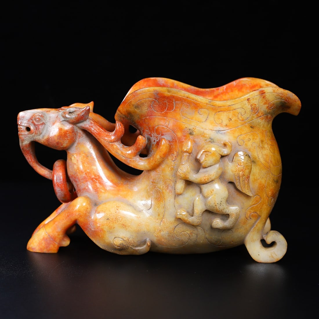 An Exquisite White Jade Figure Pattern Deer-Shaped Cup: An Exquisite White Jade Figure Pattern Deer-Shaped Cup,Qing Dynasty,China,Size:14.6cmx24cmx12cm,Weight:2986g (The Dimensions Of All Batches Are Manually Measured.If You Need More Detailed