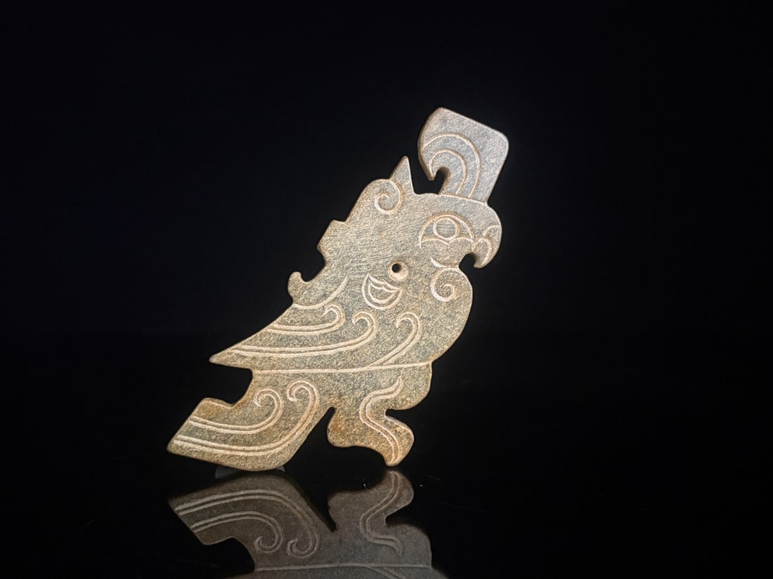 An Exquisite White Jade Bird Pendant: An Exquisite White Jade Bird Pendant,Qing Dynasty,China,Size:9.3cmx4.7cmx0.5cm,Weight:35g (The Dimensions Of All Batches Are Manually Measured.If You Need More Detailed Information, Please Contact Our