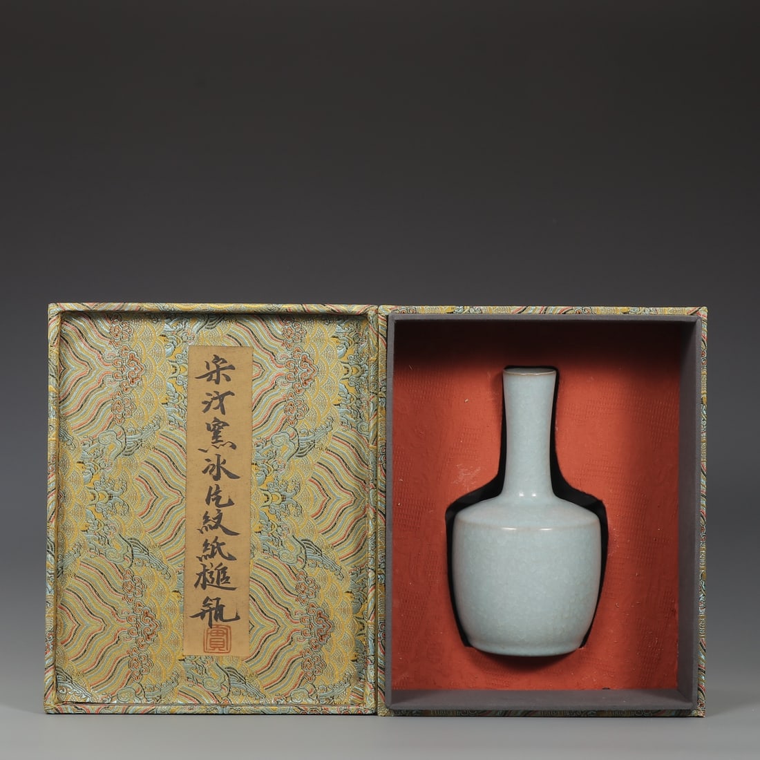 An Exquisite Ru yao Vase: An Exquisite Ru yao Vase,Song Dynasty, ChinaSize:21.5cmx4cmx12cm (The Dimensions Of All Batches Are Manually Measured.If You Need More Detailed Information, Please Contact Our Customer Service Before