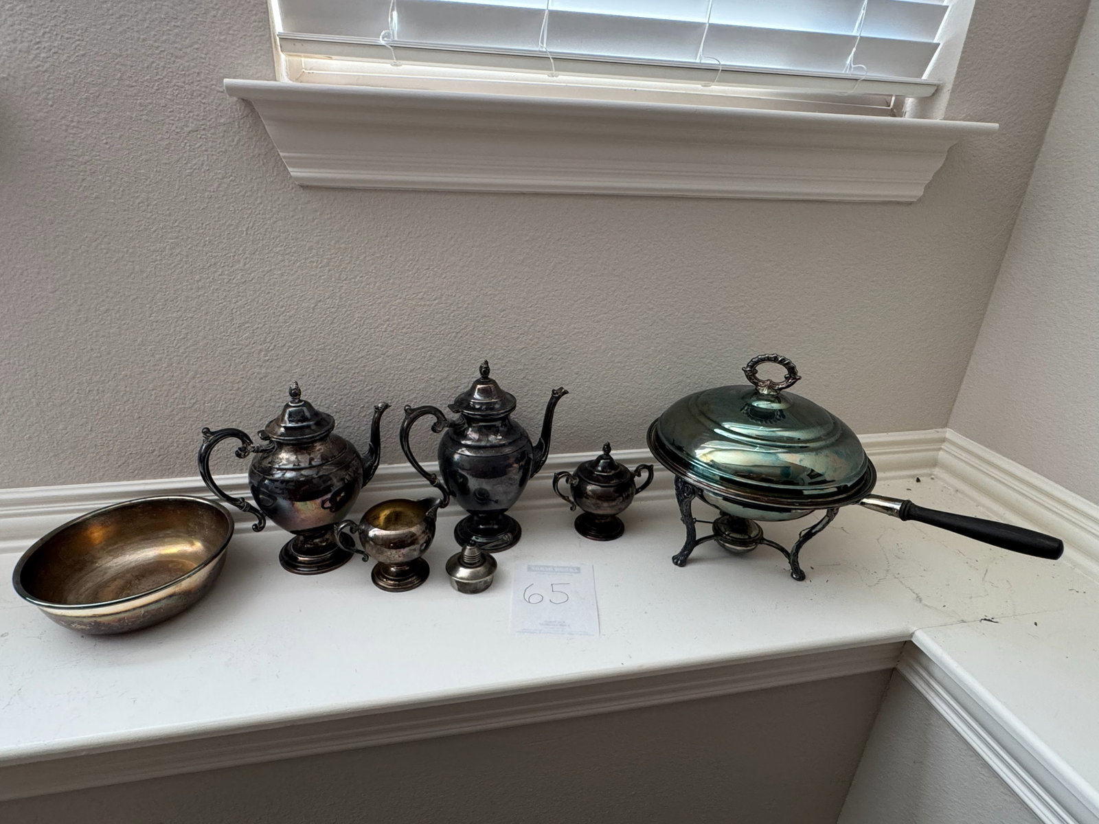Assorted Silver-Plated Tableware: Collection of eight vintage silver-plated pieces in assorted forms, patterns, and styles. Includes a variety of decorative and functional tableware and serving pieces.