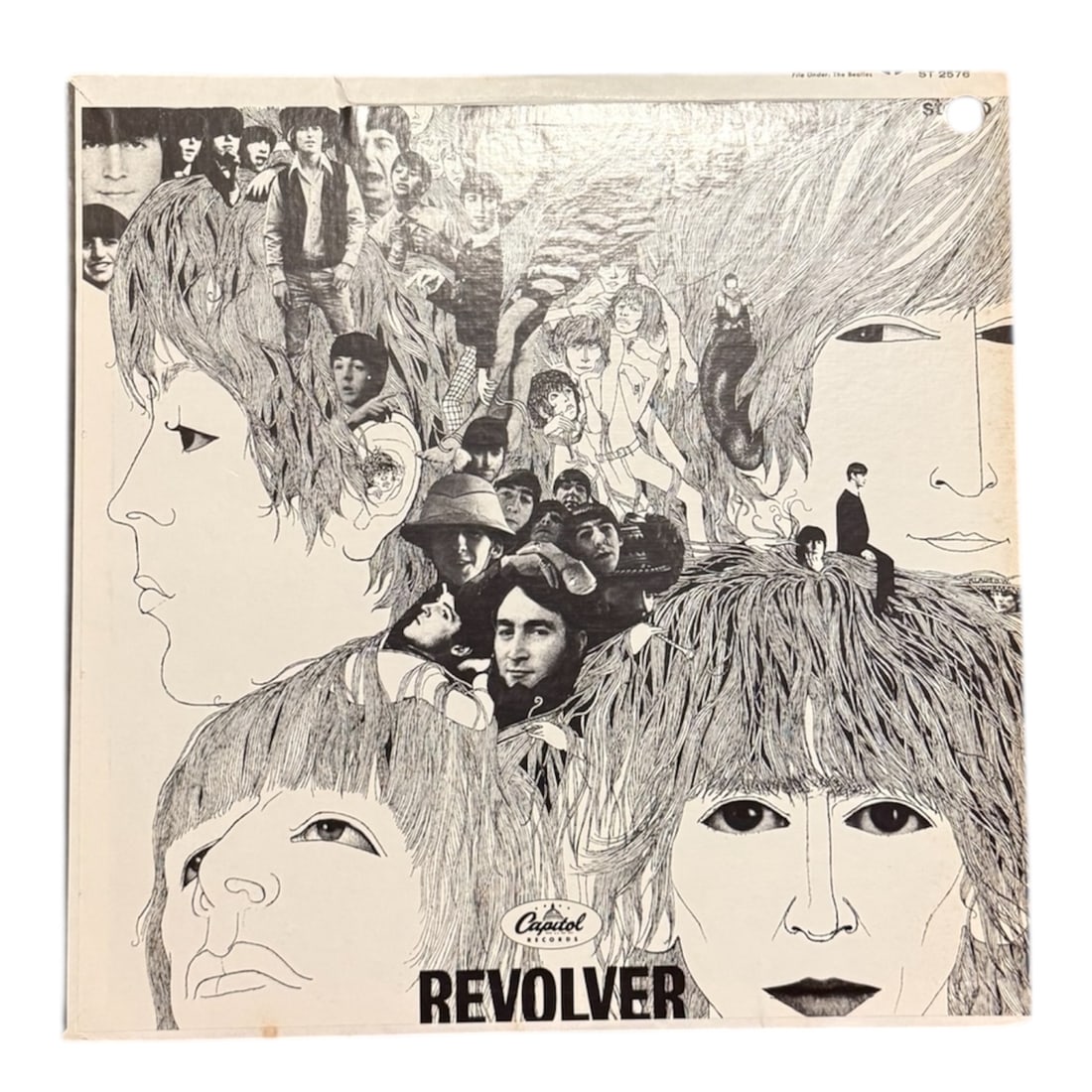 The Beatles - Revolver LP (US Pressing): The Beatles - Revolver LP (1966)- US PressingHeight 12.375 x Width 12.375 x Depth 0.0625 in inches.