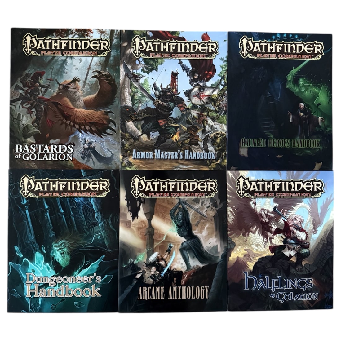 Pathfinder Player Companion Books (Assortment 2): Six Paperback Pathfinder Player Companion Books:Armor Master's HandbookBastards of GolarionArcane AnthologyDungeoneer's HandbookHalfings of GolarionHaunted Heroes HandbookEach book measures:Height 11