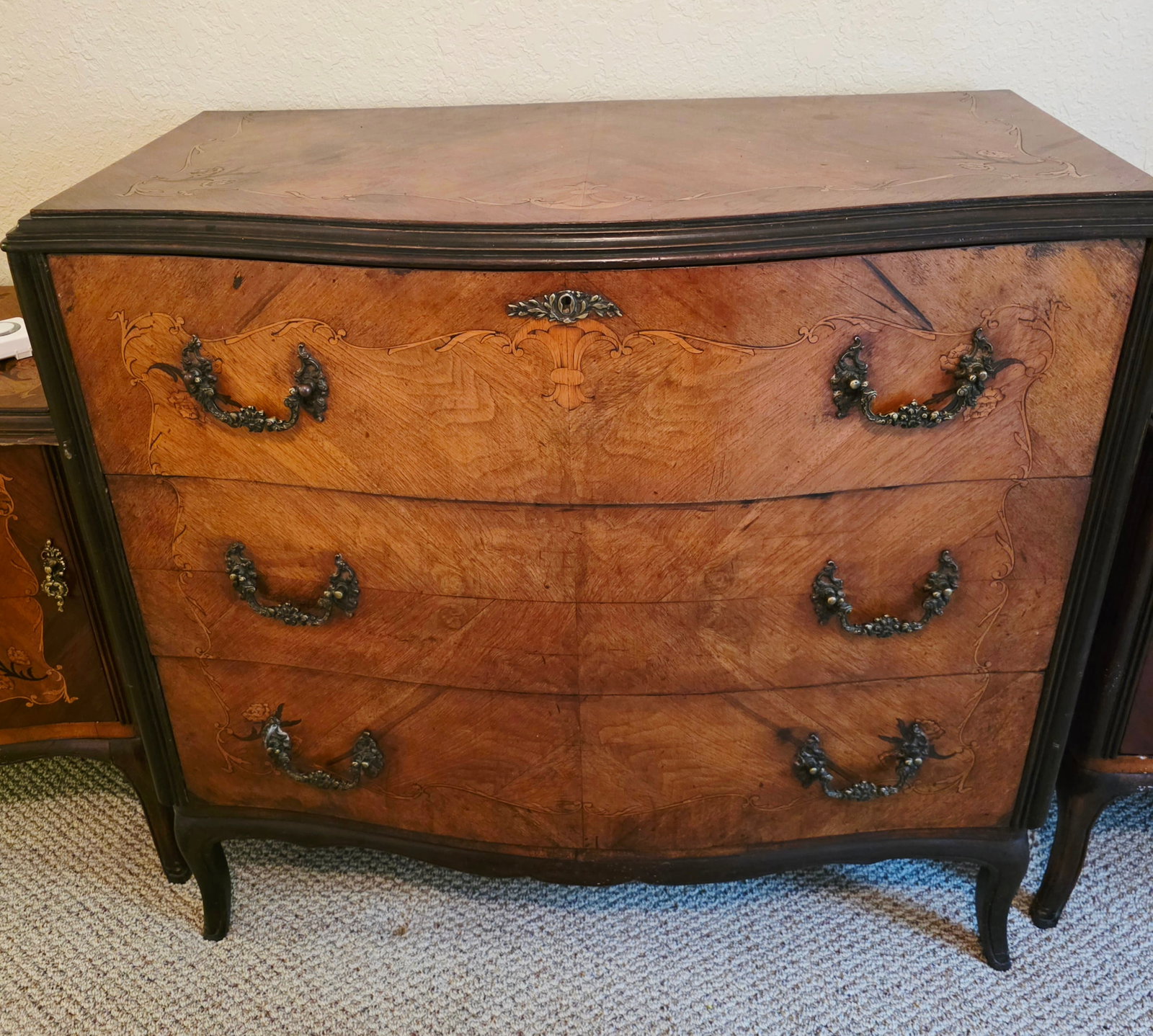 French Louis XV style Bombe Chest of Drawers and Secretarie: Multi-functional French Louis XV style bombe commode-bureau serves as both a chest of drawers and a hidden writing station. The top faux-drawer panel is hinged at the bottom. Releasing the lock