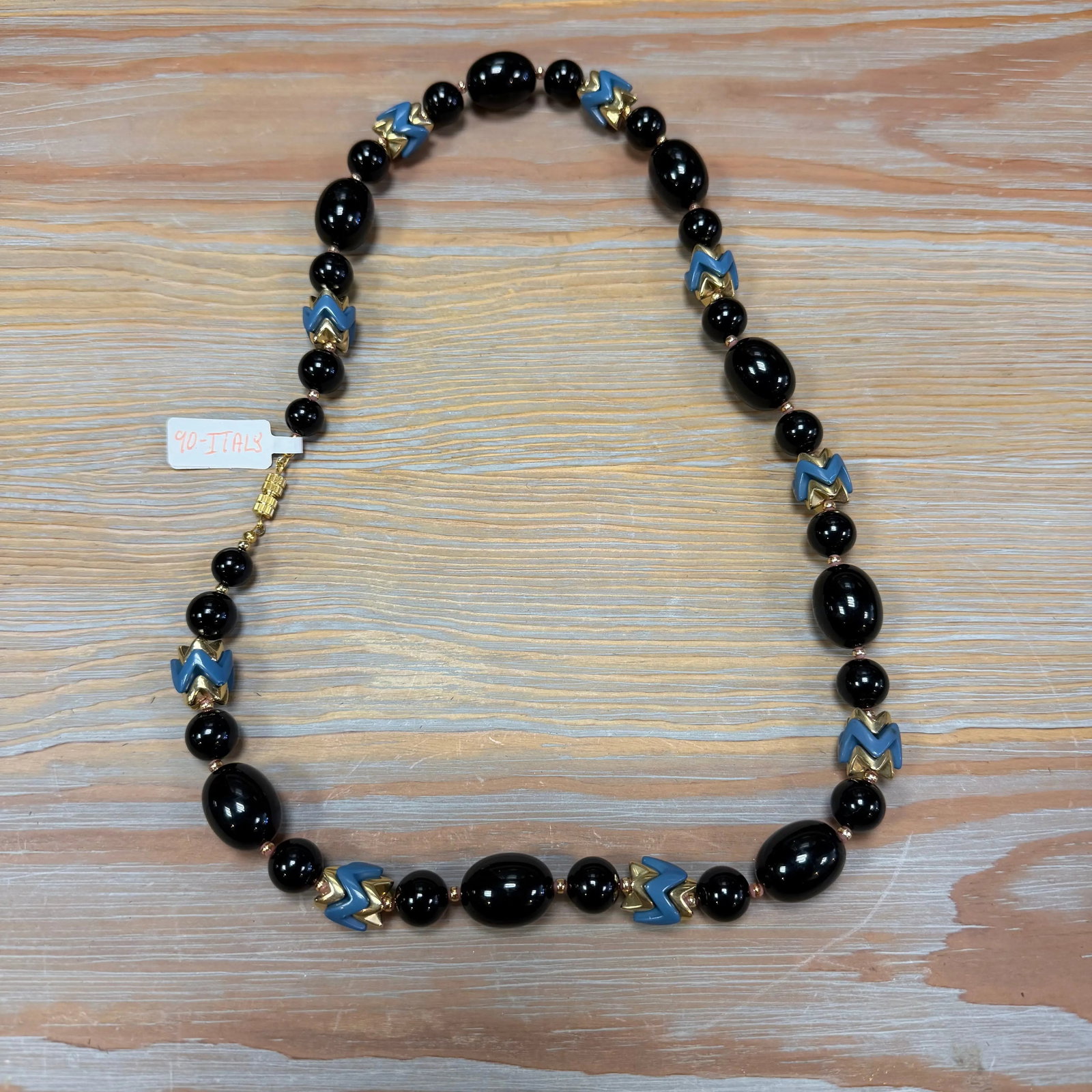 Designer "90-Italy" Necklace 22" Length, HD45: Oversized jet-black beads with blue-and-gold zig-zag elements.