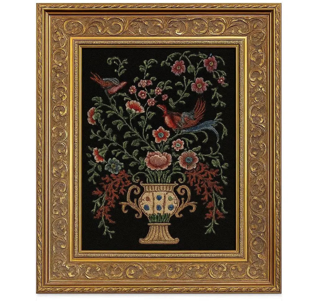 Decorative tapestry featuring embroidered birds, flowers, and foliage on a black fabric background.: Decorative tapestry featuring embroidered birds, flowers, and foliage on a black fabric background. Approx. 21" x 25"