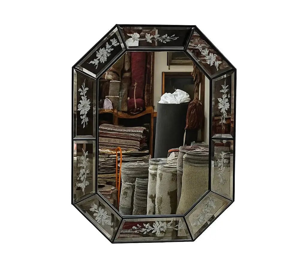 Elegant vintage octagonal mirror featuring detailed floral etching on beveled glass panels. Approx. (1 of 1)