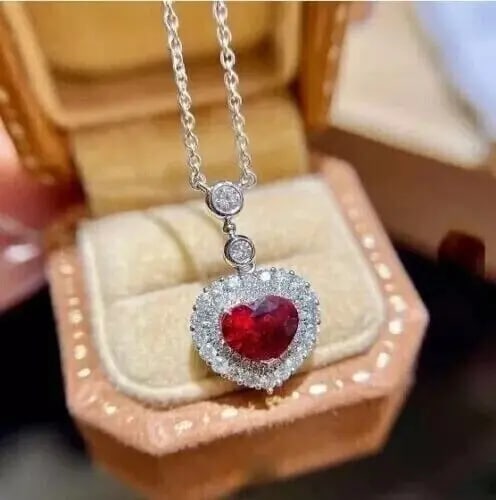 Exceptional Quality Heart Cut Simulated Red Ruby Women's Pendant With Chain In 14k White Gold Plated: Our gemstones are organic, natural stones suitable for investment, collectors, and fine jewelry, each accompanied by an authentic certification. Our 925 silver pieces are rhodium-plated and finished w