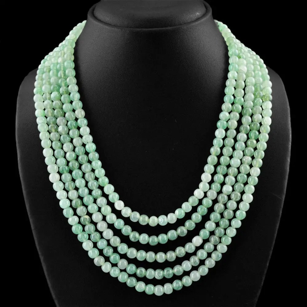 Exceptional Quality 719.50 CTS 5 LINE GREEN AQUAMARINE UNTREATED ROUND BEADS NECKLACE (DG): AAA+ Certified Quality 719.50 CTS NATURAL 5 LINE GREEN AQUAMARINE UNTREATED ROUND BEADS NECKLACE (DG) We can arrange GIA certification and verification for vintage jewelry, diamonds, and gemstones. Th