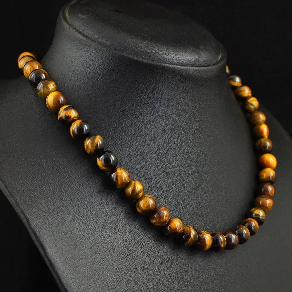 Exceptional Quality 263 Cts Earth Mined Golden Tiger Eye Round Shape Beads Womens Necklace JK 44E393: AAA+ Certified Quality 263 Cts Earth Mined Golden Tiger Eye Round Shape Beads Womens Necklace JK 44E393 We can arrange GIA certification and verification for vintage jewelry, diamonds, and gemstones. 