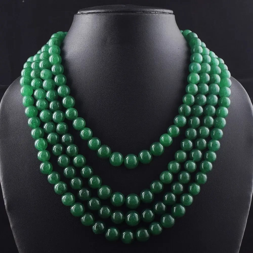 Exceptional Quality Most Brilliant 1198 Cts 4 Strand Green Emerald Beads Necklace Jewelry Cus-Jew134: AAA+ Quality 1198 Cts Earth-Mined GreenEmerald 4-Strand Beaded Necklace Product Details: Gemstone: Natural Emerald (Earth-Mined) Total Weight: Approx. 1198 Carats Bead Shape: Round Strands: 4 Strands 